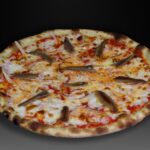 Pizza SICILIANA, Tomate, mozzarella, cebolla y anchoas